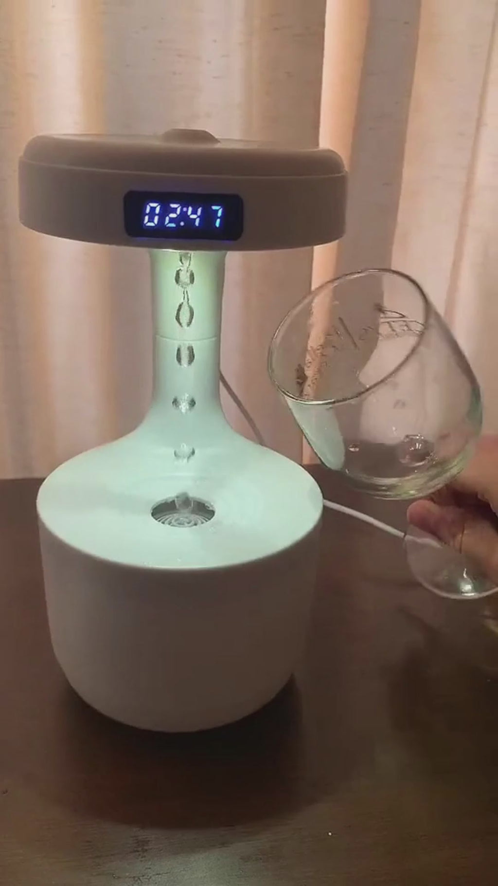 "Premium Anti-Gravity Levitating Water Drops Air Humidifier - Modern Home Wellness & Decor.